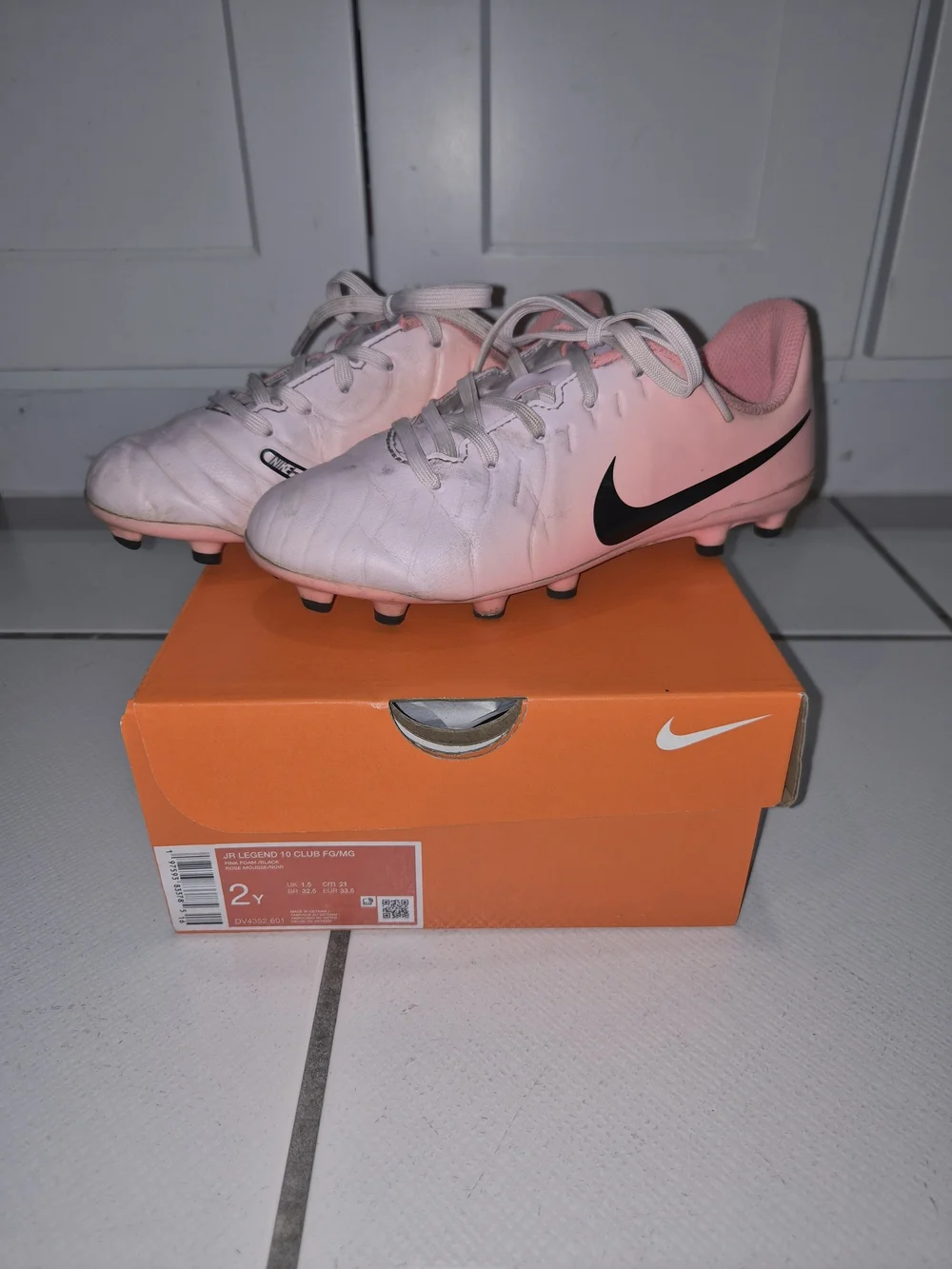 Nike Pink Soccer Cleats with Black Swoosh